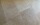 Détail du sol intérieur en pierre beige