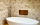 Vasque sur plan de travail en pierre naturelle, style salle de bain moderne
