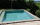 Piscine avec terrasse, plage claire, pose opus romain