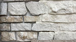 Parement mural à coller en pierre naturelle du Périgord avec face arrière sciée